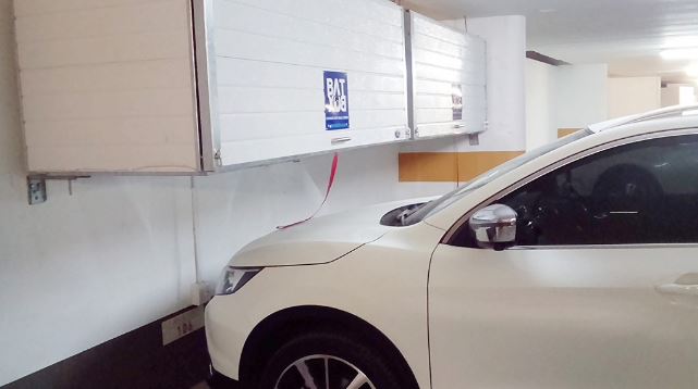 BatBox overhead storage unit installed above parking bay in Cape Town apartment